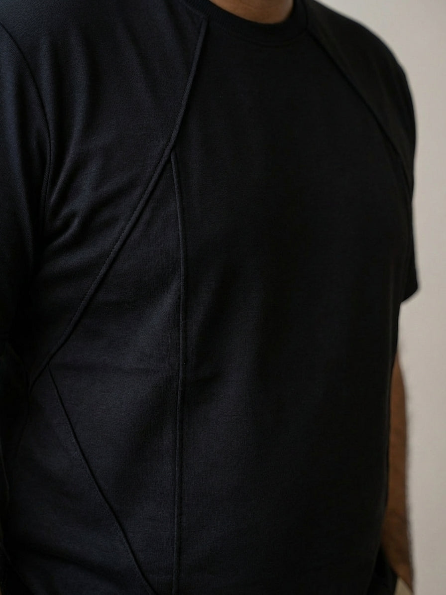 Close-up of panel stitching on structured tee designed for better shape and fit.